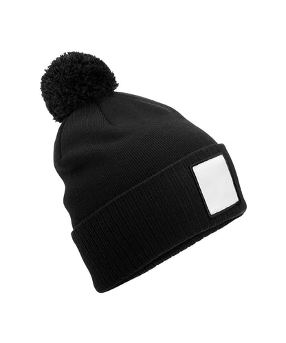 Tryck din logga på Mössor från Beechfield - Anpassa Applikations patch pom beanie i färgen Svart One Size för företag, föreningar och privatpersoner