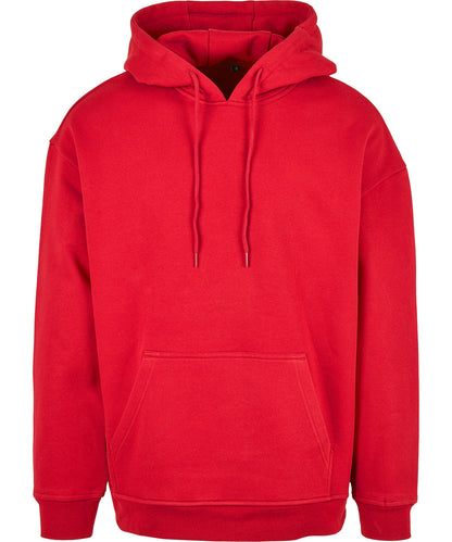 Tryck din logga på Hoodies från Build Your Brand Basic - Anpassa Build Your Brand Basic - Bas Hoodie i Oversize-modell i färgen Mellan röd för företag, föreningar och privatpersoner
