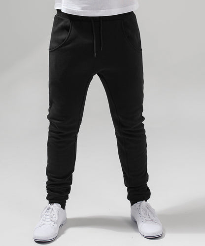 Tryck din logga på Mjukisbyxor från Build Your Brand - Anpassa Kraftiga mjukisbyxor med djup byxmudd i färgen för företag, föreningar och privatpersoner
