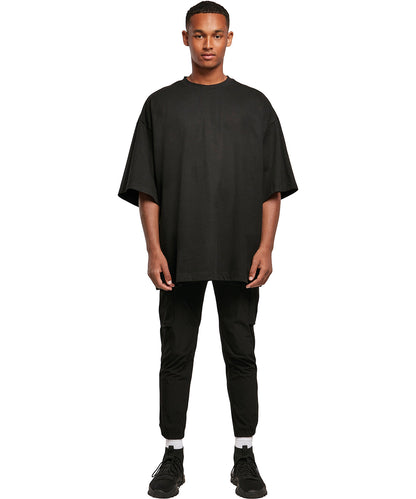 Tryck din logga på T-shirts från Build Your Brand - Anpassa Huge Oversized Tee - Unisex i färgen för företag, föreningar och privatpersoner