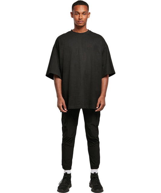 Tryck din logga på T-shirts från Build Your Brand - Anpassa Huge Oversized Tee - Unisex i färgen för företag, föreningar och privatpersoner