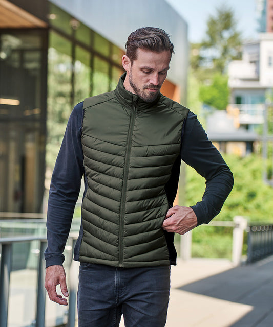 Tryck din logga på Termovästar från Stormtech - Anpassa Montserrat termisk Linne i färgen för företag, föreningar och privatpersoner