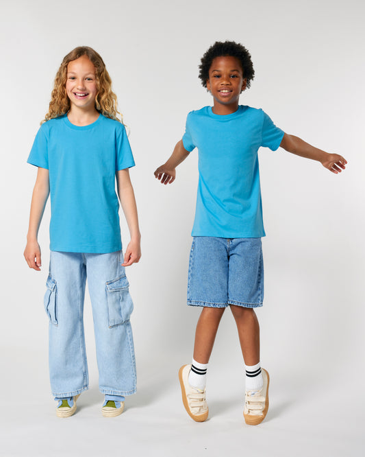 Tryck din logga på T-shirts design från Stanley/Stella - Anpassa Stanley/Stella Kids Mini Creator 2.0 – Ikonisk Barn-T-shirt i Ekologisk Bomull i färgen för företag, föreningar och privatpersoner